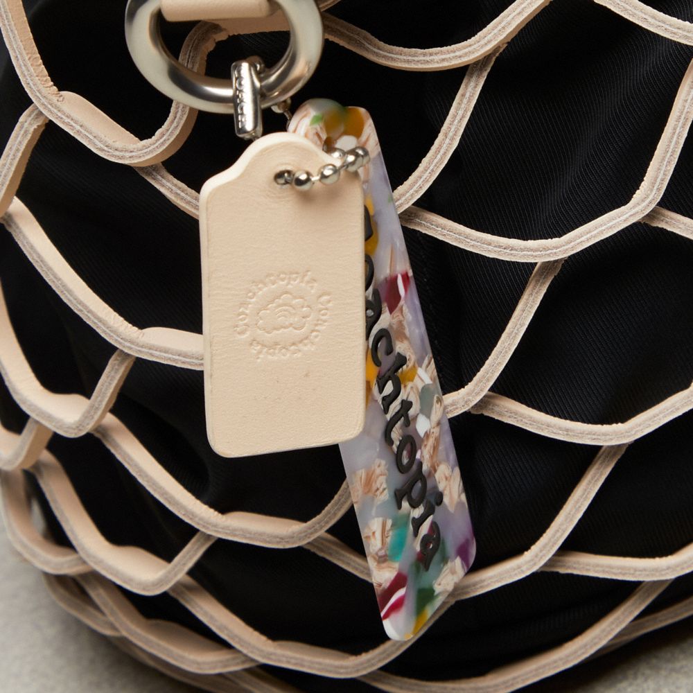 Coach Basket Bag In Regenerative Leather Black/Chalk | COH865124