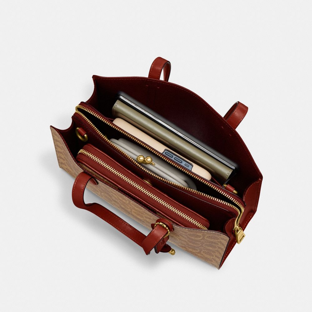 Coach Carter Carryall Bag 28 In Signature Canvas Coated Canvas/Brass/Tan/Rust | COH865093