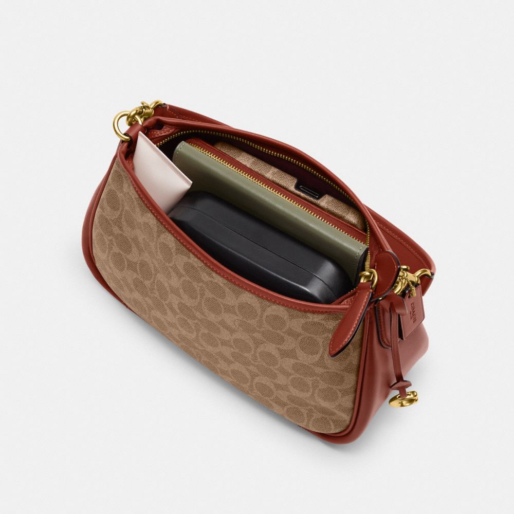 Coach Cary Crossbody Bag In Signature Canvas Signature Coated Canvas/Brass/Tan/Rust | COH865354