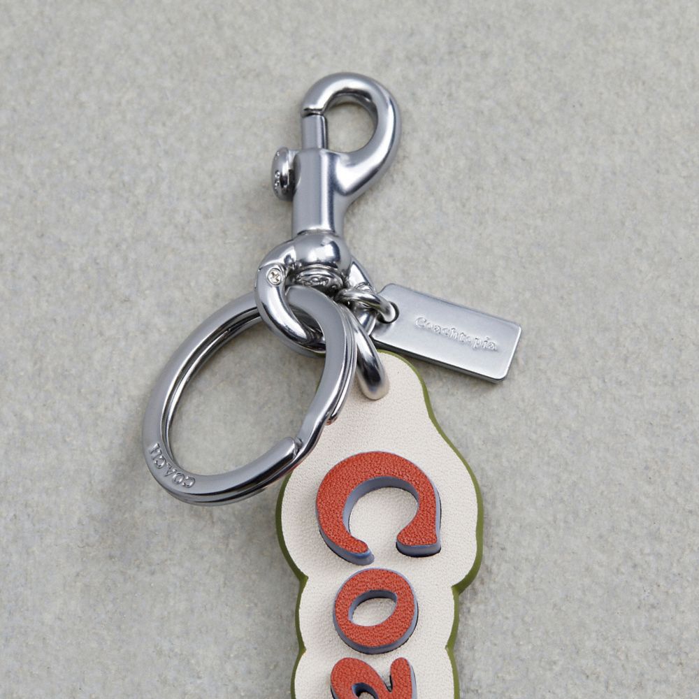 Coach Coachtopia Bag Charm In Coachtopia Leather Deep Orange/Twilight Multi | COH866433