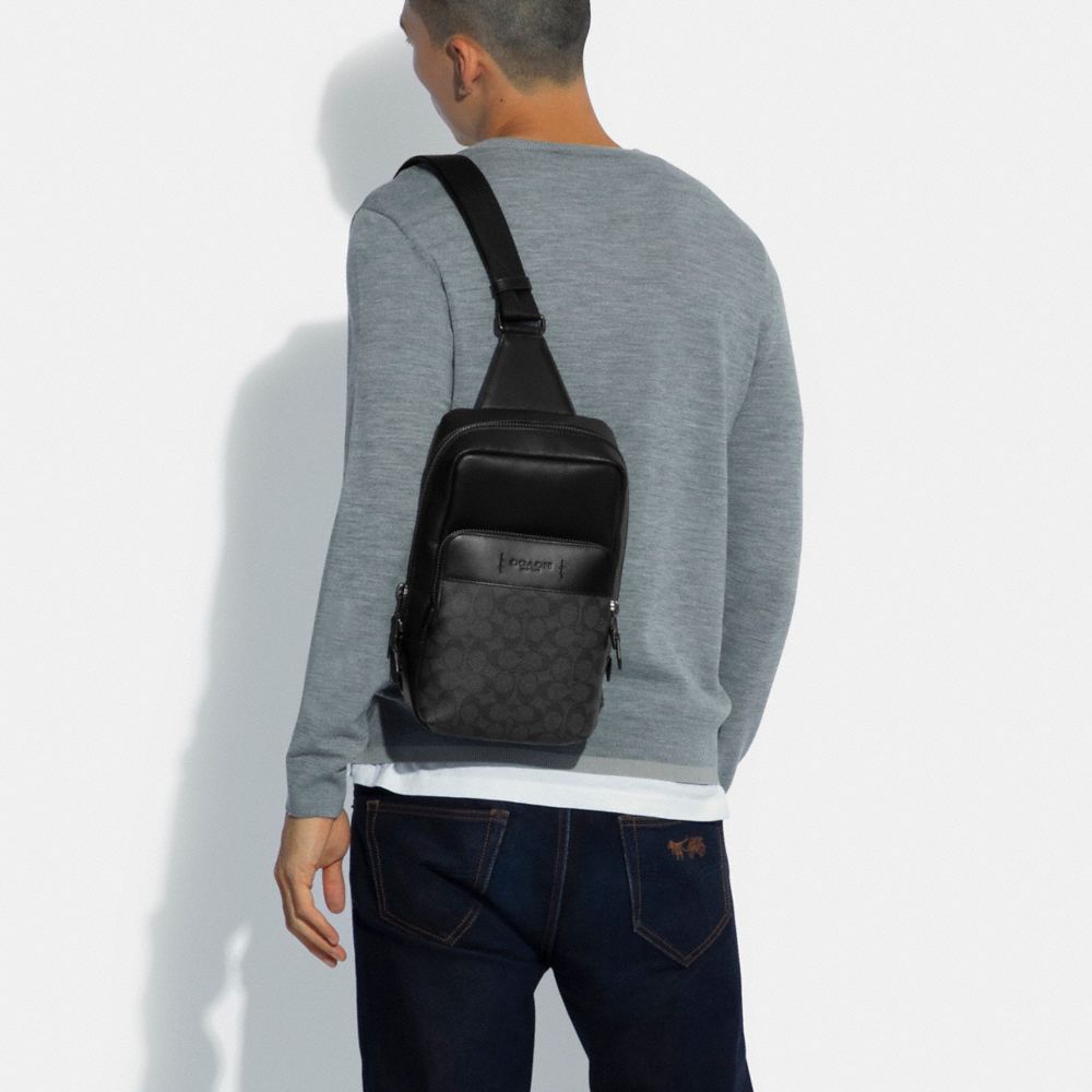 Coach Gotham Pack In Signature Canvas Signature Coated Canvas/Smooth Leather/Black Copper/Charcoal/Bla | COH866584